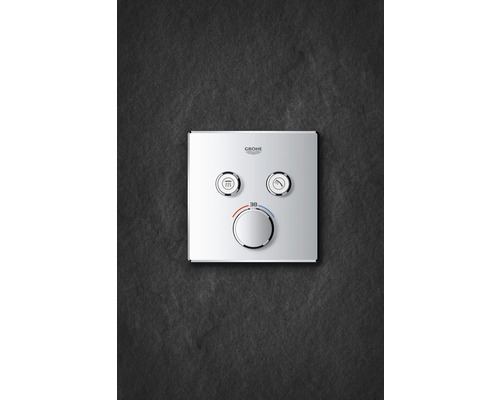 Logo Grohe. Sprchový termostat s funkcí plnění vany a regulátorem teploty.