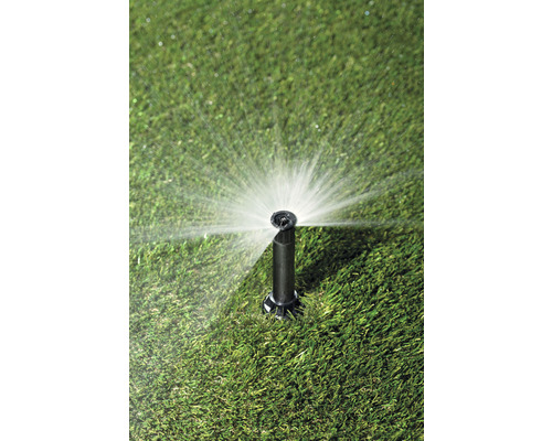 Zavlažovač trávníku při zavlažování