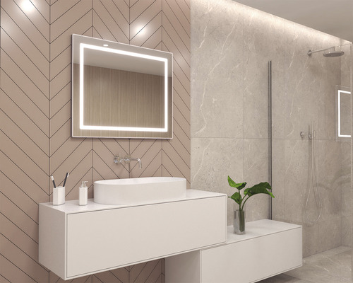 Moderní koupelna s osvětleným zrcadlem, umyvadlem a sprchou