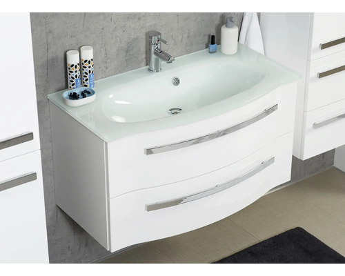 Bílá skříňka pod umyvadlo se dvěma zásuvkami a skleněnou deskou