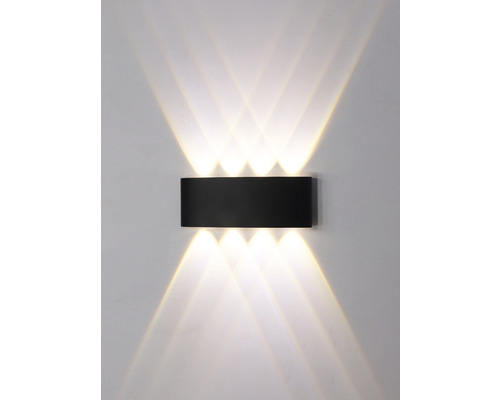 Černé nástěnné svítidlo se světelnými paprsky nahoru a dolů