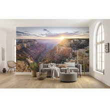 Obývací pokoj s fototapetou Grand Canyon, pohovkou a dekorací