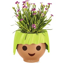 Květináč hravého designu s kvetoucí rostlinou