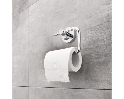 Kovový držák toaletního papíru s rolí toaletního papíru