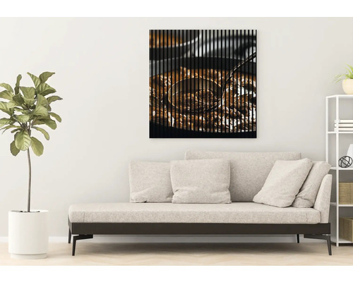 Dekorativní nástěnný obraz s motivem jídla nad pohovkou