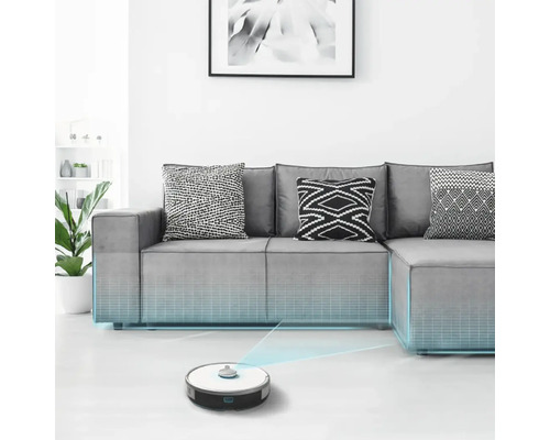 Robotický vysavač v světlém obývacím pokoji pod pohovkou