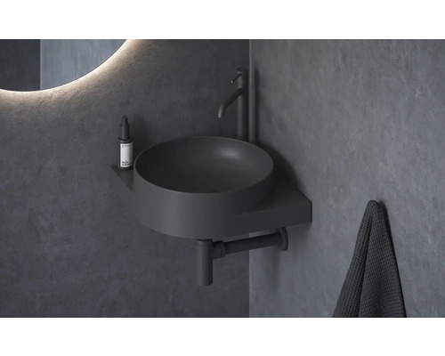 Koupelnové umyvadlo s baterií a ručníkem