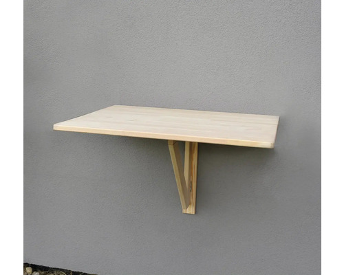 Skládací dřevěný stolek připevněný ke zdi