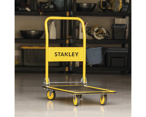 Logo Stanley na žlutém transportním vozíku