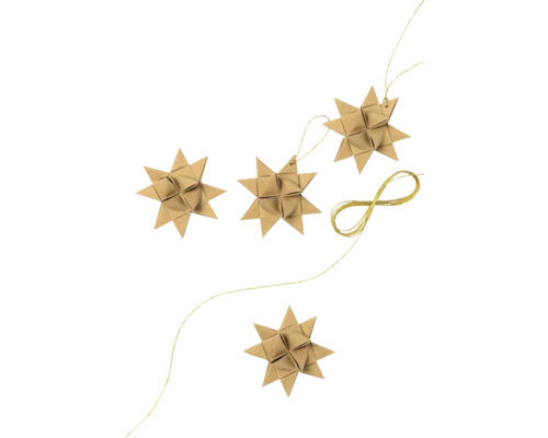 Čtyři papírové hvězdy se závěsnou nití jako dekorace