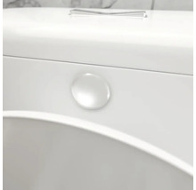 Detail bílého splachovadla toalety