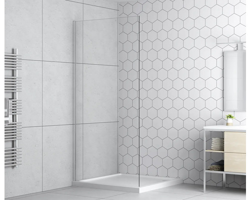 Světlá koupelna se sprchovým koutem, umyvadlem a radiátorem