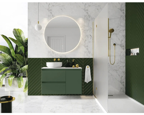 Moderní koupelna se zelenou skříňkou pod umyvadlo, kulatým zrcadlem a sprchou
