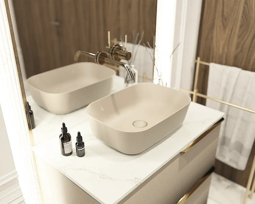 Koupelnové umyvadlo na skříňce s vodovodní baterií a držákem na ručníky