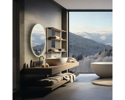 Moderní koupelna s umyvadlem, zrcadlem, policemi a vanou před oknem s výhledem na hory