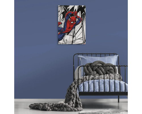 Dekorativní plátno s motivem Spidermana nad postelí v dětském pokoji