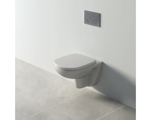 Závěsná toaleta s ovládacím panelem v koupelně