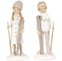 Ozdobné figurky dívky a chlapce se lyžemi