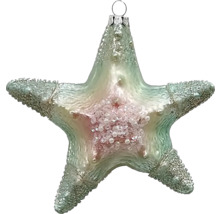 Ozdoba na vánoční stromeček ve tvaru hvězdy s očkem na zavěšení