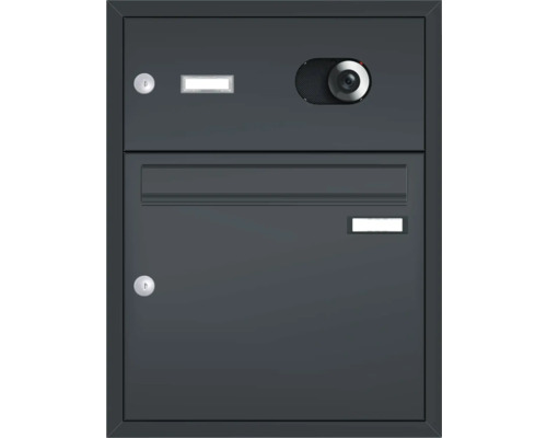 Poštovní schránka s integrovanou kamerou na zeď domu