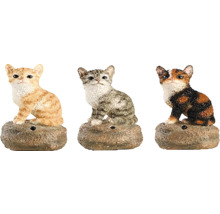 Tři dekorační figurky koček na podstavcích