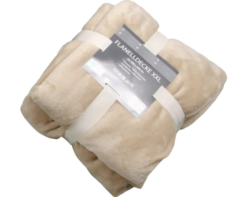 Balená béžová flanelová deka XXL z polyesteru, přibližně 220 krát 240 centimetrů.