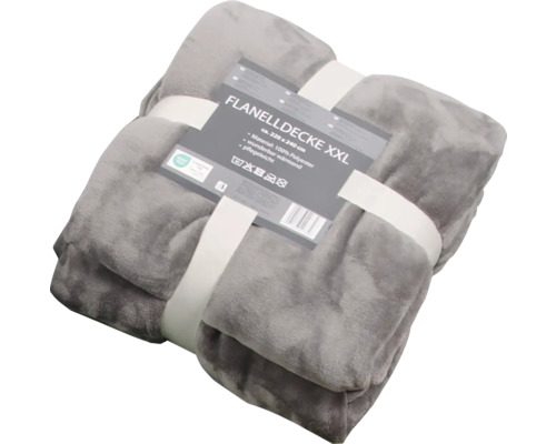 Šedá XXL flanelová deka o rozměrech přibližně 220 x 240 centimetrů ze 100% polyesteru, zabalená