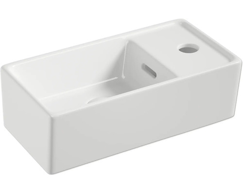 Bílé umyvadlo na desku ze sanitární keramiky