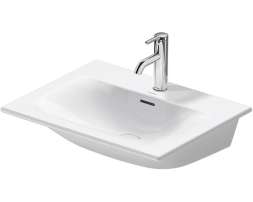 Bílé umyvadlo na desku s vodovodní baterií