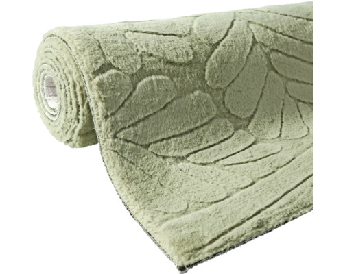 Srolovaný koberec s motivem listů