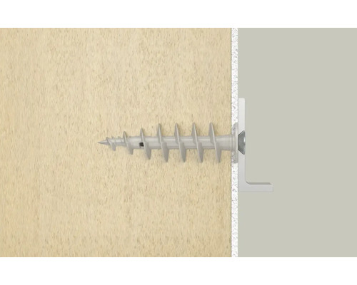 Šroub hmoždinky je umístěn ve zdi.