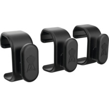 Tři černé držáky grilovacího nářadí Weber