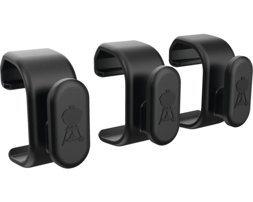 Tři černé držáky grilovacího nářadí Weber