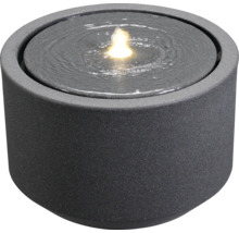 Kulatá pokojová fontána z kamene s vodou a světlem