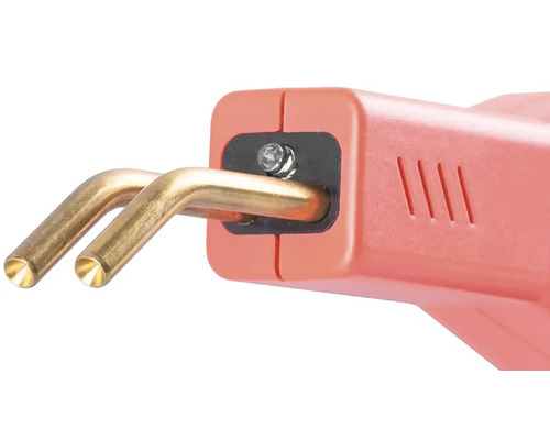 Detailní pohled na svařovací zařízení na plasty se dvěma zlatými elektrodami.