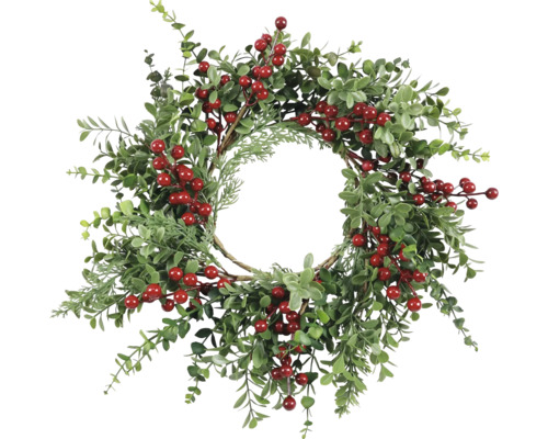 Dekorativní věnec se zelenými listy a červenými bobulemi