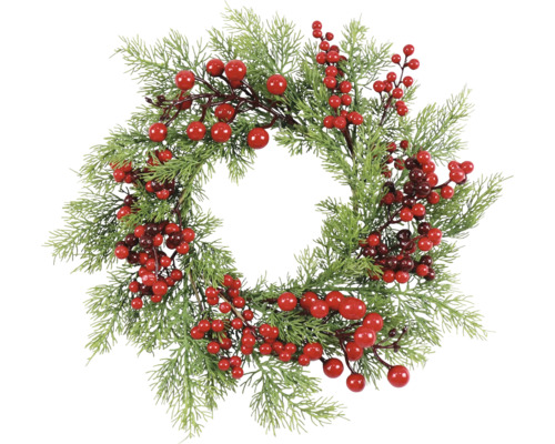 Dekorativní věnec s bobulemi a větvemi borovic pro vánoční období