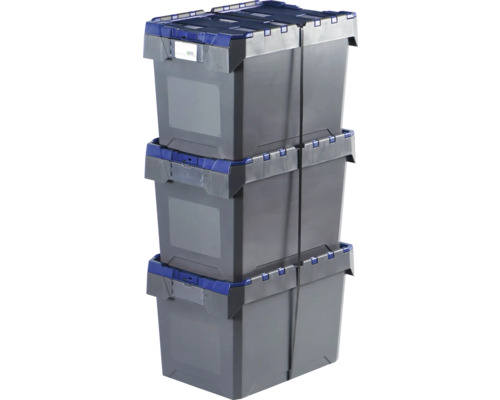 Tři šedé plastové úložné boxy, naskládané na sobě a upevněné popruhy.