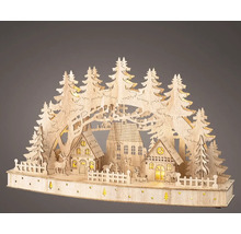 Vánoční dekorace s domy, zvířaty a stromy ze dřeva, osvětlená