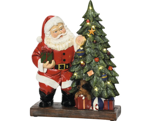Santa Claus s vánočním stromkem a psem na dárcích