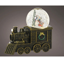 Sněhová koule na vlakovém podstavci se zimními postavami uvnitř.