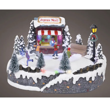 Dekorativní vánoční scéna s bruslaři, prodejním stánkem a osvětlením