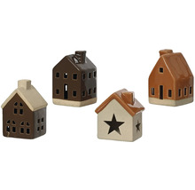 Čtyři dekorativní keramické domky na svíčky