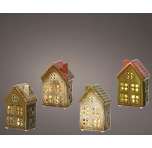 Čtyři dekorativní keramické domky s okenními otvory pro čajové svíčky