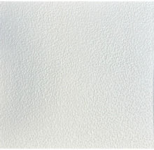 Detail bílého texturovaného povrchu.