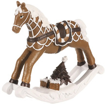 Houpací kůň s vánočním stromkem a dárky jako dekorace