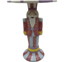 Dekorační stolek ve tvaru louskáčka s pruhovaným povrchem