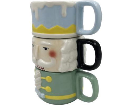 Tři naskládané hrnky s designem louskáčka