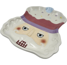 Dekorativní servírovací talíř na ořechy z keramiky.