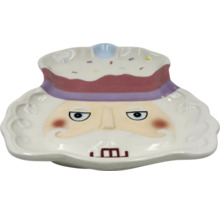 Dekorativní keramická mísa s obličejem a pokrývkou hlavy